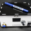 Image of Pick+ station with a pen on top for scale